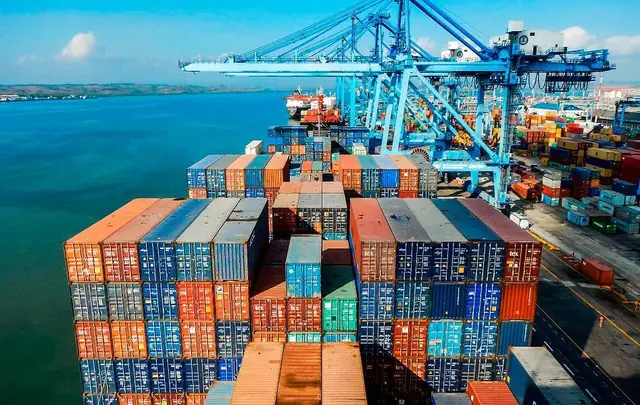 Containers stacked on a vessel at a container terminal